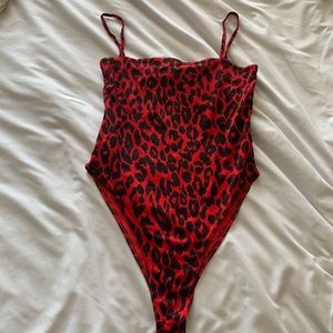 Red and Black cheetah print body suit